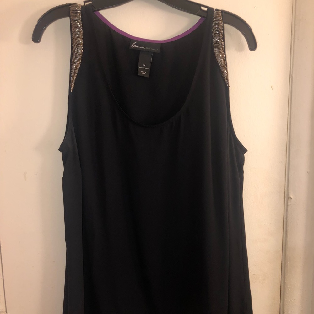 Very classy top to add to your collection!
